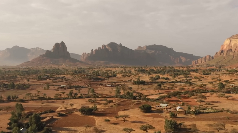 A Scenic View of Ethiopia's Rugged Landscape, Showcasing Mountains and Vast Open Terrain